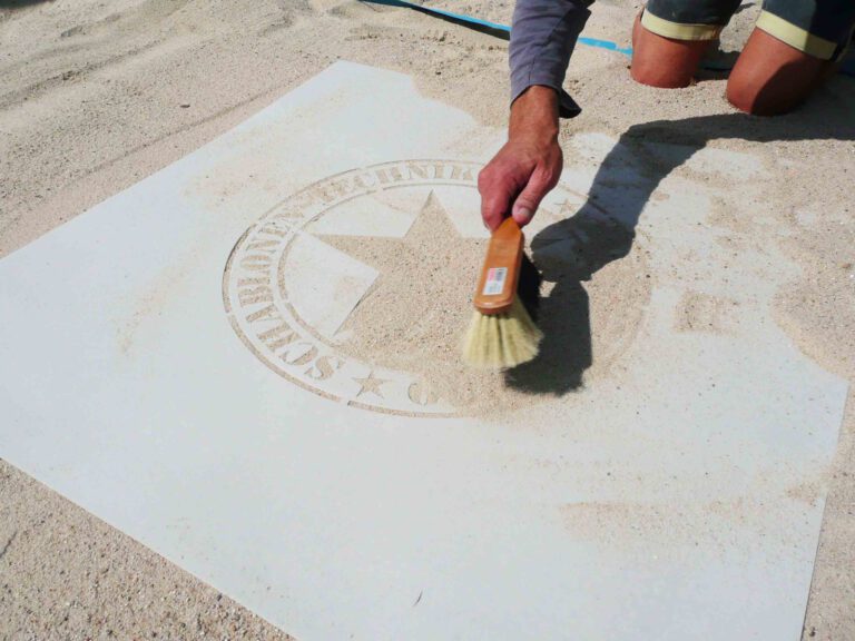 Kreidespray-Aktion am Strand: