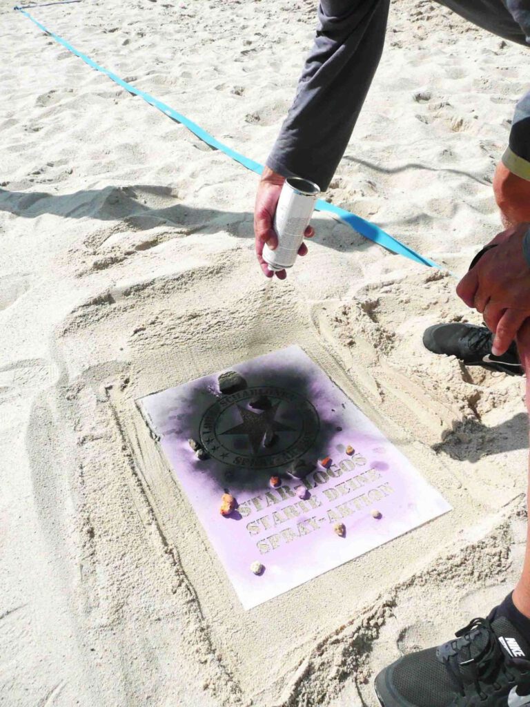 Kreidespray-Aktion am Strand: