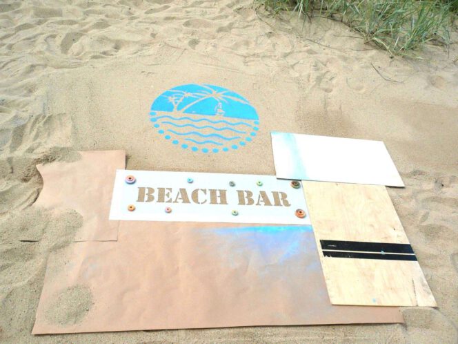 Kreidespray-Aktion am Strand: Ränder abdecken