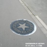 Kreidespray-Aktion auf der Straße, Tag 1, die Logo-Schablone